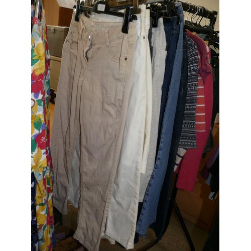 387 - A QUANTITY OF EXCELLENT QUALITY LADIES CLOTHES TO INCLUDE JEANS, CORDS, TOPS, DASH, JOHN LEWIS, M&S