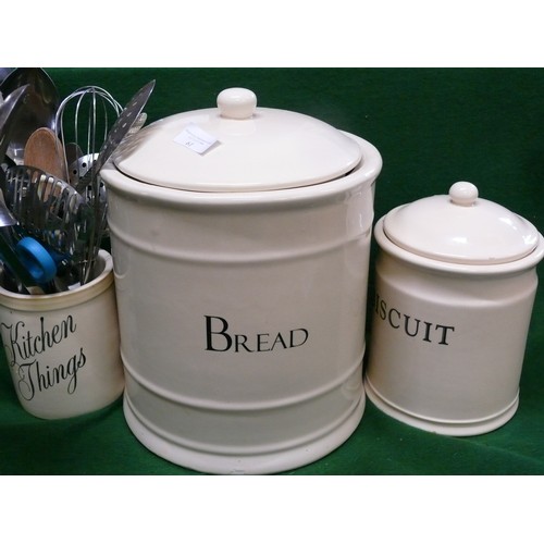 61 - A LARGE CERAMIC BREAD CROCK, BISCUIT BARREL AND KITCHEN THINGS POT WITH CONTENTS OF UTENSILS  (BREAD... 