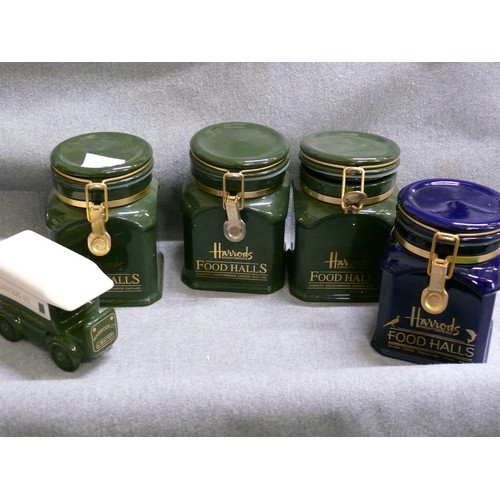 95 - 4 LARGE CERAMIC HARRODS FOOD HALLS CANNISTERS AND A HARRODS CERAMIC VINTAGE TRUCK MODEL