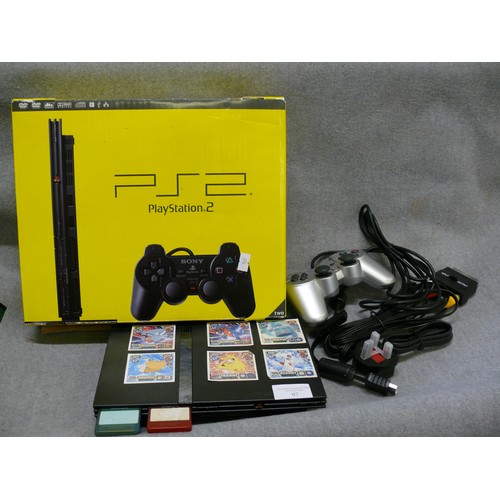 97 - A PLAYSTATION 2, BOXED WITH CABLES AND CONTROLLER