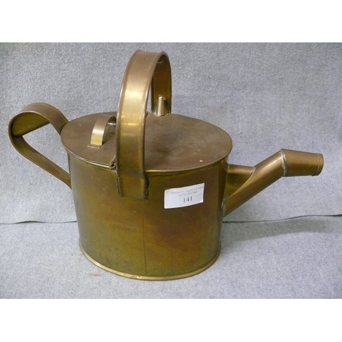 141 - AN UNUSUAL BRASS WATERING CAN