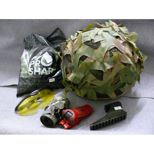 143 - A SELECTION OF PAINTBALLING EQUIPMENT TO INCLUDE TWO HELMETS, GOGGLES PAINTBALLS AND MORE.