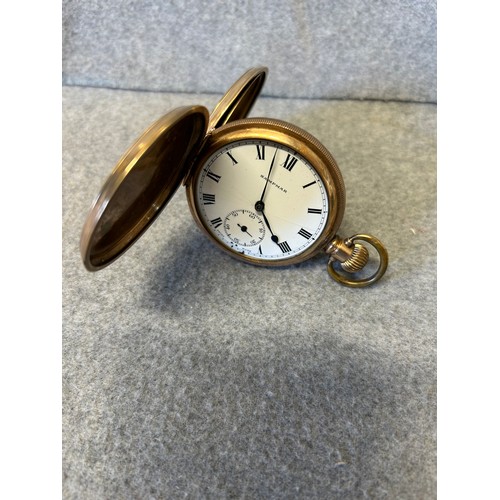 13 - AN ANTIQUE FULL HUNTER  POCKET WATCH WITH ROSE GOLD PLATED DENNISON CASE, WORKING WHEN LOTTED, NEEDS... 