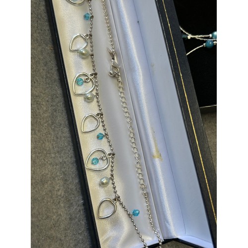 24 - 2 BOXES OF LOVELY NECKLACES FIRST SET WITH EARRINGS SILVER WIRE  BLUE BEADS AND SEA SHELL THE OTHER ... 