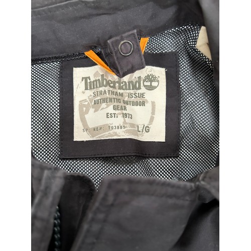 451 - 2 x TIMBERLAND GENTS COATS IN BLACK SIZE L/G AND A “COUNTRY SQUIRE” GILET IN FOREST GREEN SIZE L