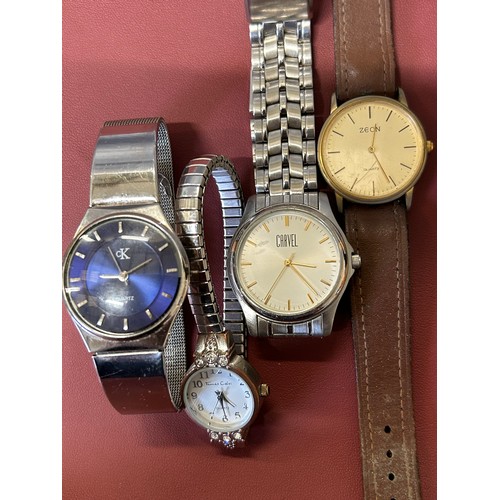 35 - A CALVIN KLEIN GENTS WATCH PLUS A THOMAS CALVI (WORKING ) A ZEON GENTS  AND A CARVEL GENTS WATCH