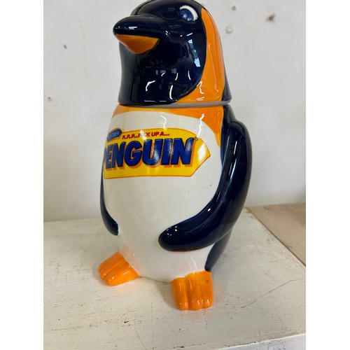 84 - A LARGE CERAMIC 'PENGUIN' BISCUIT BARREL IN THE SHAPE OF A PENGUIN