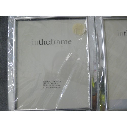 148 - A SELECTION OF NEW CHROME PICTURE FRAMES