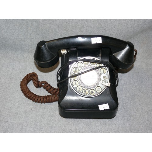 201 - A VINTAGE BLACK DIAL TELEPHONE WITH MODERN PLUG