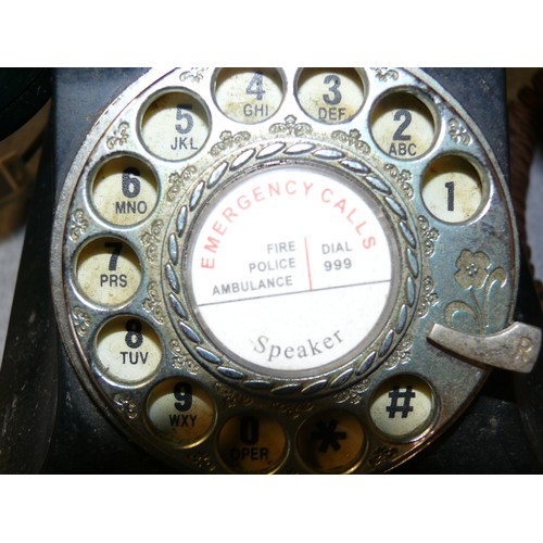 201 - A VINTAGE BLACK DIAL TELEPHONE WITH MODERN PLUG