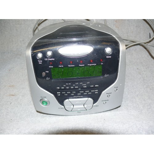 213 - A ROBERTS DUAL ALARM CD RADIO AND A DIGITAL PHOTOFRAME