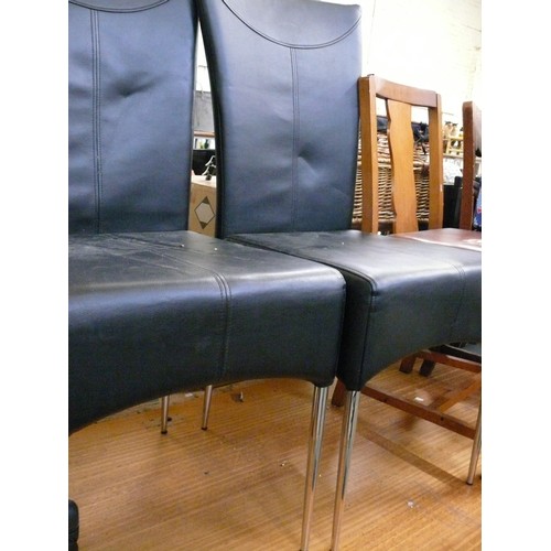 333 - FOUR BLACK FAUX LEATHER HIGH BACKED DINING CHAIRS WITH TUBULAR CHROME LEGS.