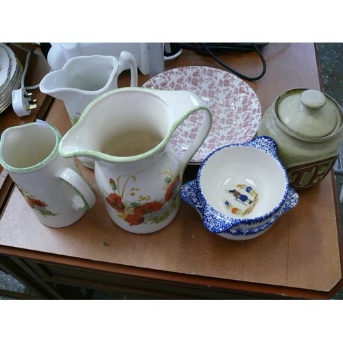 386 - 3 LARGE CERAMIC JUGS, 2 LARGE DISHES, A STONEWARE TEA CADDY AND 2 SMALL 2 HANDLED BOWLS.