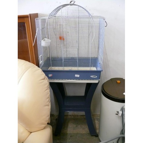 439 - A LARGE FLOORSTANDING BIRD CAGE WITH DOME TOP