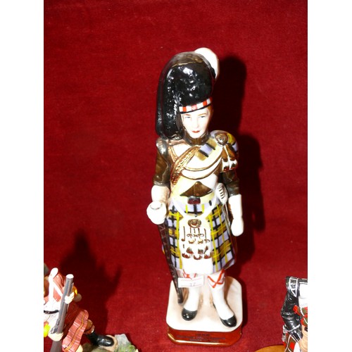 74 - 3 SCOTTISH SOLDIER FIGURINES TO INCLUDE A 1958 GORDON HIGHLANDERS DRUM MAJOR