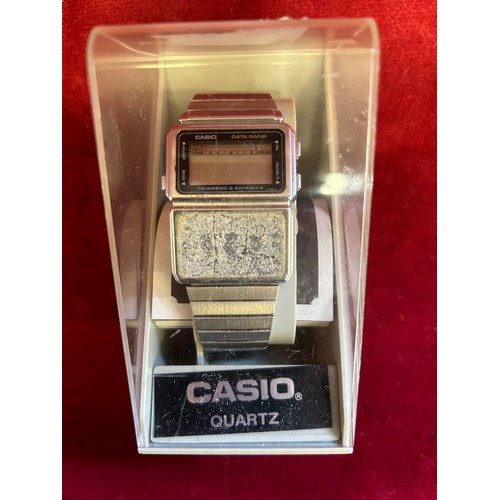 31 - A VINTAGE CASIO DIGITAL WATCH IN BOX WITH INSTRUCTIONS