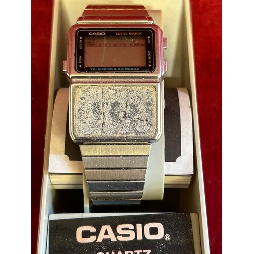 31 - A VINTAGE CASIO DIGITAL WATCH IN BOX WITH INSTRUCTIONS