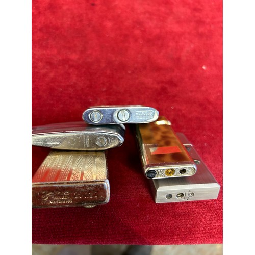 19 - COLLECTION OF 5 CIGARETTE LIGHTERS, RONSON HADSON, A MUSICAL,ONE WITH A.K.47