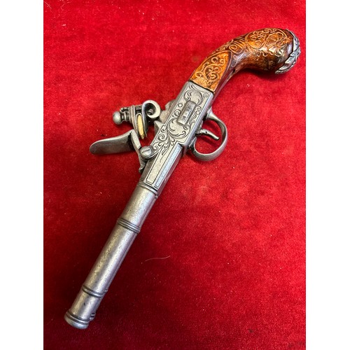 58 - A REPLICA OF A DOUBLE BARREL FLINT LOCK PISTOL MADE LONDON 1776 WORKING ORDER