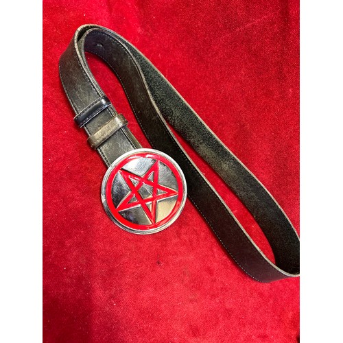 17 - A LEATHER BELT WITH LARGE PENTAGRAM BELT BUCKLE