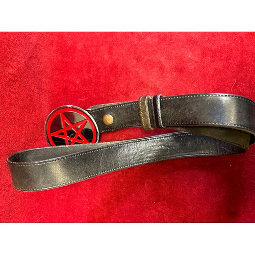 17 - A LEATHER BELT WITH LARGE PENTAGRAM BELT BUCKLE