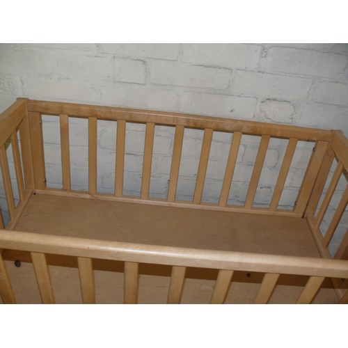 194 - A WOODEN SWINGING CRIB (NEEDS TLC) PLUS A MOSES BASKET