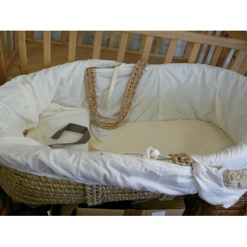 194 - A WOODEN SWINGING CRIB (NEEDS TLC) PLUS A MOSES BASKET