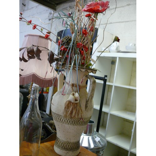 218 - LARGE CERAMIC VASE CONTAINING FAUX FLOWERS & GRASSES.