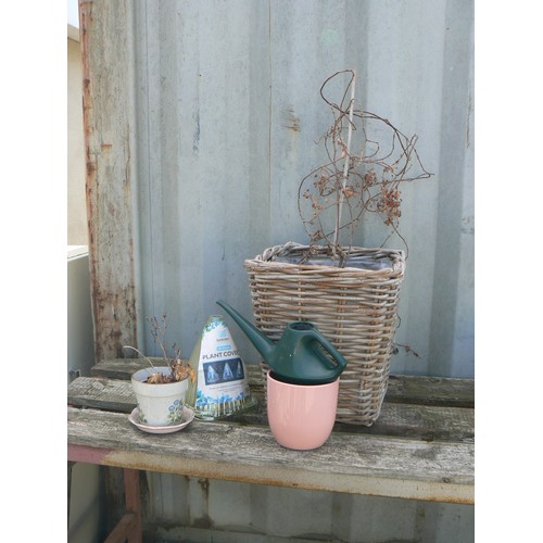 261 - WICKER BASKET PLANTER WITH SMALL WATER CAN, PLANT COVERS ETC.