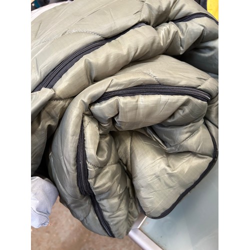 383 - QUILTED KHAKI COLOURED SLEEPING BAG