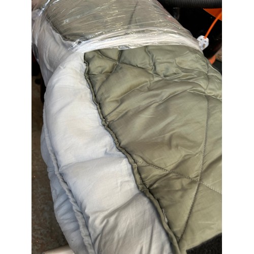 383 - QUILTED KHAKI COLOURED SLEEPING BAG