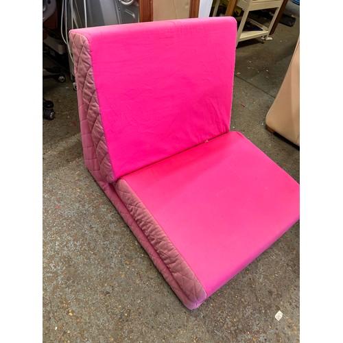 393 - CHILDRENS BEDROOM FOLDING CHAIR BED IN CANDY PINK