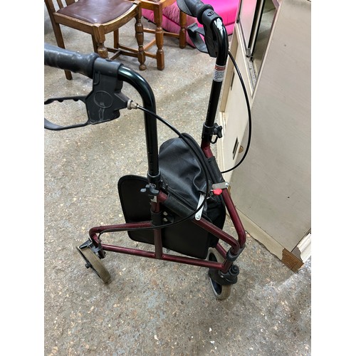 487 - A TRI FOLDING MOBILITY WALKER