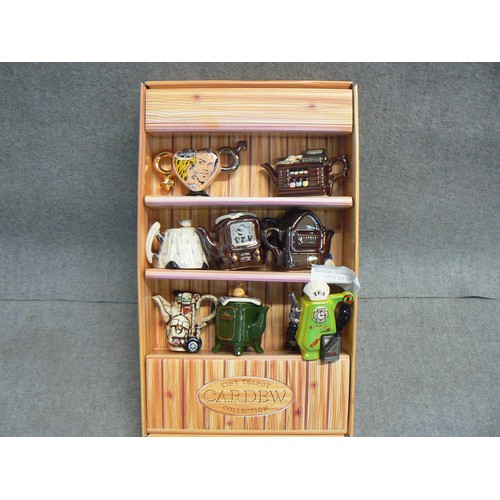 52 - A TINY TEAPOT COLLECTION BY CARDEW TO INCLUDE 8 DECORATIVE TEAPOTS WITH ORIGINAL BOX