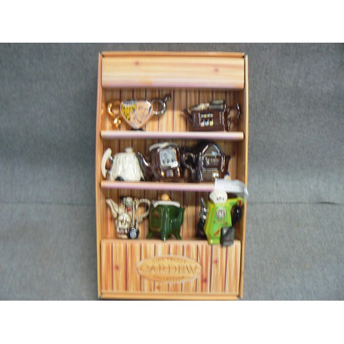 52 - A TINY TEAPOT COLLECTION BY CARDEW TO INCLUDE 8 DECORATIVE TEAPOTS WITH ORIGINAL BOX