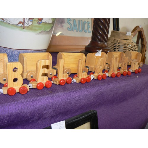 105 - 2 WOODEN TOY TRAINS