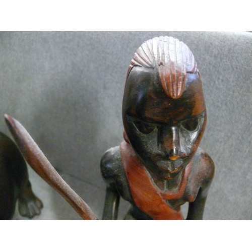 169 - CARVED WOODEN MASAAI WARRIOR AND A CERAMIC HIPPO