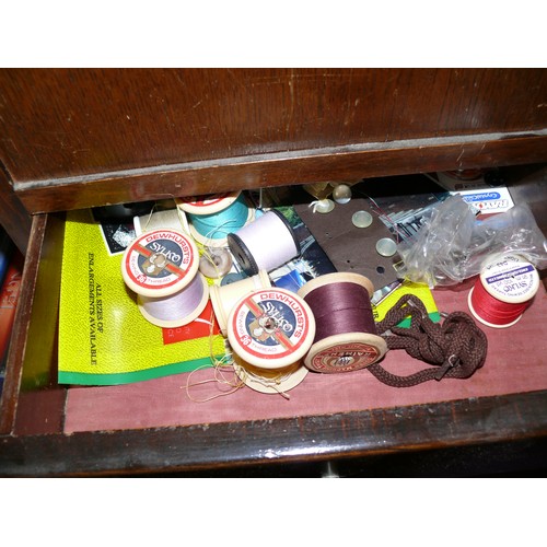 171 - VINTAGE WOODEN SEWING TABLE WITH 2 DRAWRS AND LIFT UP LID PLUS CONTENTS OF SEWING ITEMS