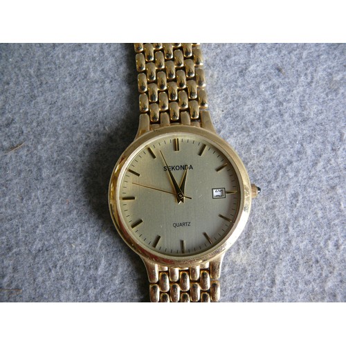 11 - A GOLD PLATED GENTS  SEKONDA QUARTZ WATCH