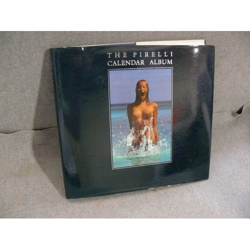 241 - THE PIRELLI CALENDAR ALBUM. SILVER ANNIVERSARY EDITION. LARGE HARDBACK BOOK CONTAINING 500 GLAMOUR P... 