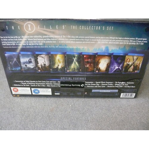 253 - THE X-FILES. THE COLLECTORS BOX SET. UNOPENED WITH PROTECTIVE SEAL.