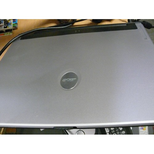 254 - ACER ASPIRE 1501LMi LAPTOP WITH LARGE LITE-ON CHARGER.