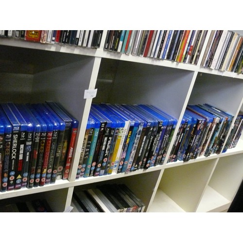 265 - 3 X CUBES OF MOSTLY NEW/SEALED BLU-RAY DVD'S. [65+] INC DR WHO, ANDROMEDA, MAN FROM UNCLE, SHERLOCK.