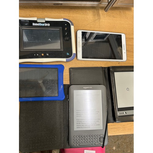 453 - KINDLE, EBOOK, AND 3 TABLETS INCLUDING SAMSUNG AND INNOTAB3 - SOME DAMAGE - SOLD AS SEEN