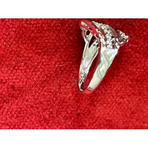 38 - A FINE SOLID SILVER DRESS RING WITH COVERED IN CUT CRYSTAL STONES SIZE P