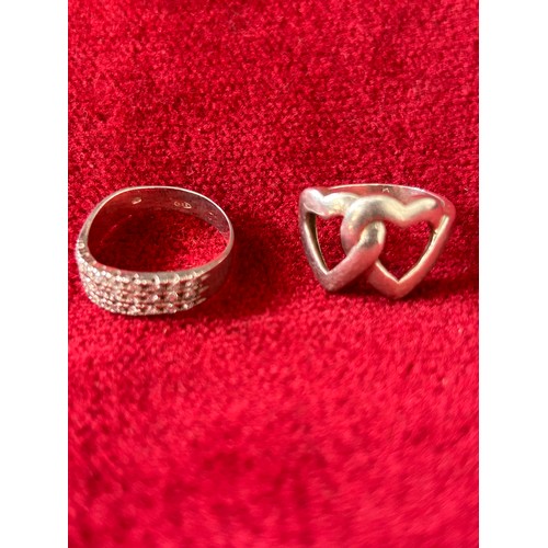 40 - 2 SOLID SILVER RINGS 1 WITH DOUBLE HEARTS SIZE M THE OTHER ENCRUSTED WITH CRYSTAL CUT STONES SIZE P