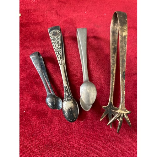 33 - COLLECTION OF 4 SUGAR NIPS OR TONGS S/PLATE