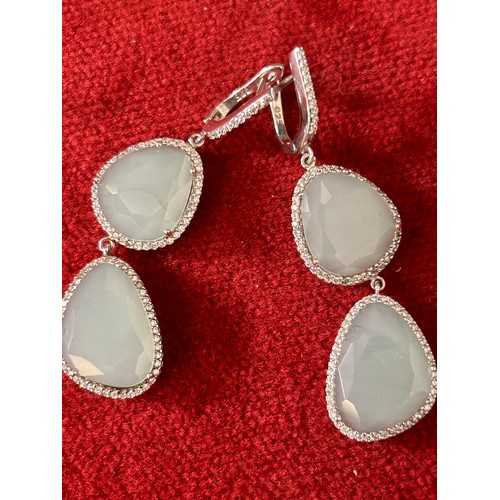 30 - A PAIR OF SILVER, CRYSTAL AND DIAMANTE EARRINGS