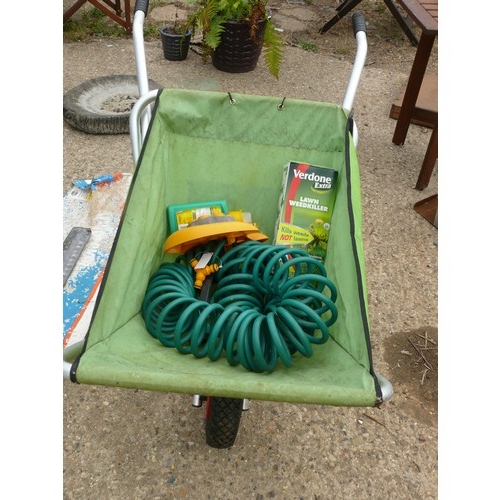 422 - FOLDING WHEELBARROW AND CONTENTS OF GARDENING ITEMS