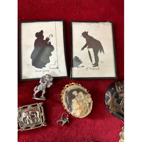 9 - A BASKET OF ECLECTIC MIX OF INTERESTING ITEMS BRASS CLOCK TWO SILHOUETTE FRAMED AND GLASSED